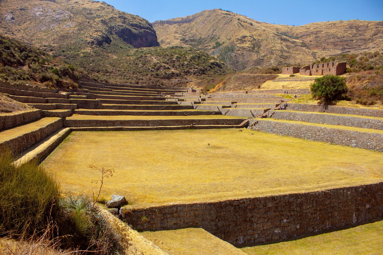Explore ancient Inca stone terraces at Tipon, Cusco, showcasing historical agriculture and stunning landscapes.