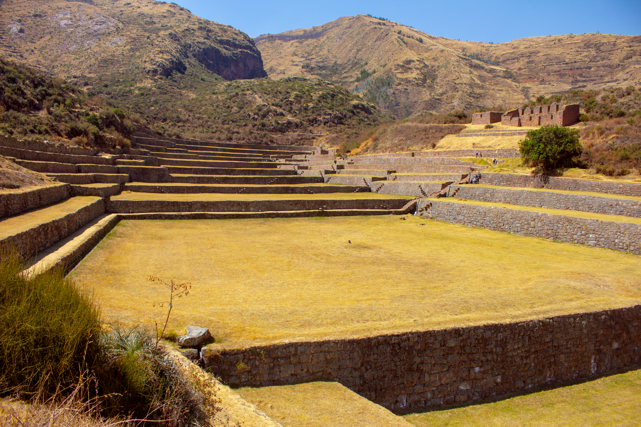 Explore ancient Inca stone terraces at Tipon, Cusco, showcasing historical agriculture and stunning landscapes.