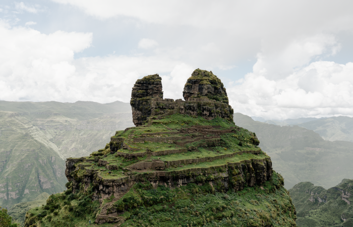 Explore the ancient Waqrapukara fortress in Peru's stunning Andes.